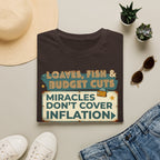 T‑Shirt — "Loaves, Fish & Budget Cuts: Miracles Don’t Cover Inflation"