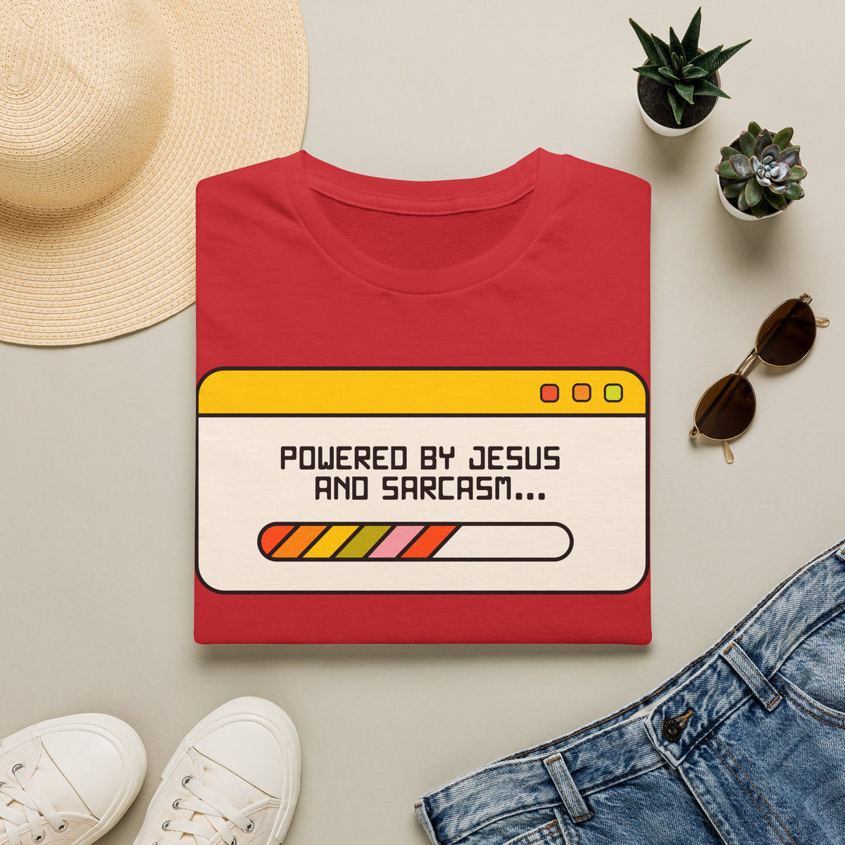T-Shirt — "Powered by Jesus and Sarcasm" Graphic Tee