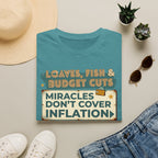 T‑Shirt — "Loaves, Fish & Budget Cuts: Miracles Don’t Cover Inflation"