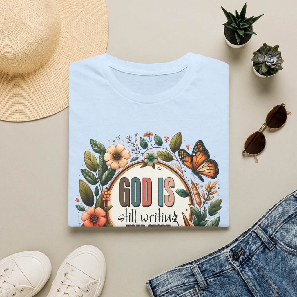 Inspirational T-Shirt — "God Is Still Writing Your Story" Floral Faith Tee