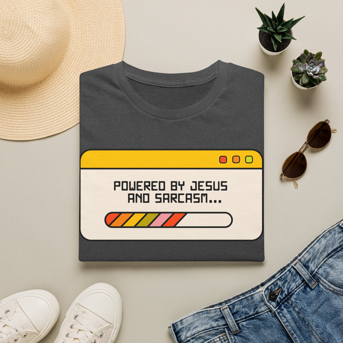 T-Shirt — "Powered by Jesus and Sarcasm" Graphic Tee