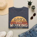 Christian T-Shirt — "God’s Still Working on My Attitude" Retro Sun Graphic